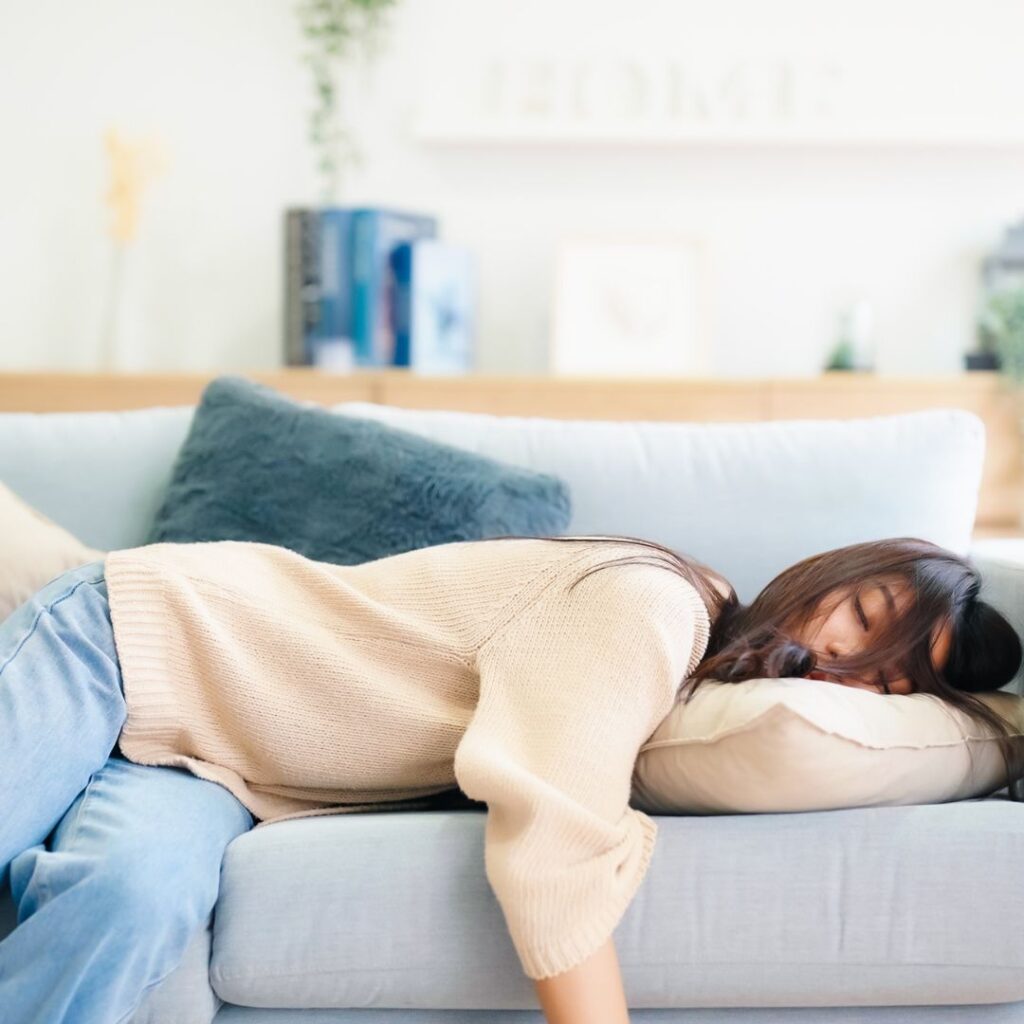 Individual experiencing fatigue and low energy seeking Ayurvedic therapy for stress relief in Delhi