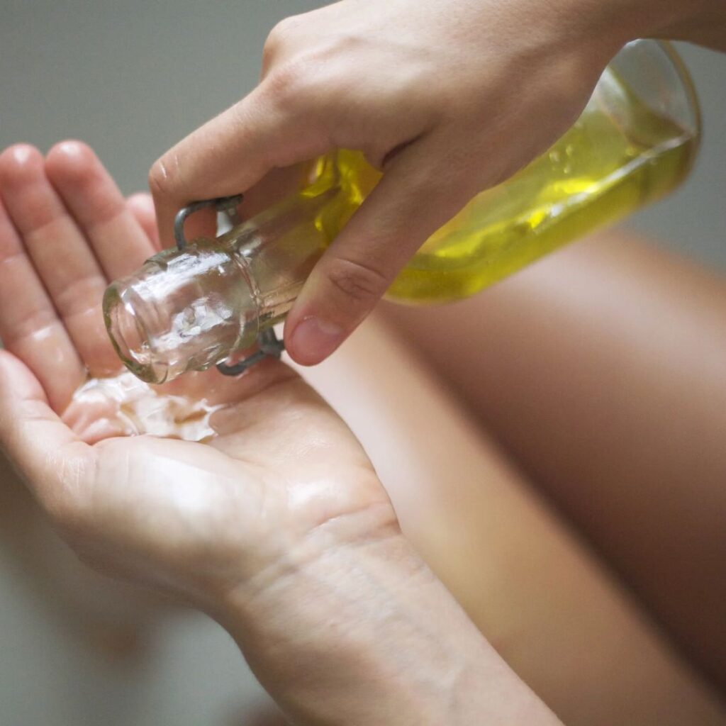 Self Abhyanga at home showing simple oil application as part of Abhyanga massage benefits for daily relaxation