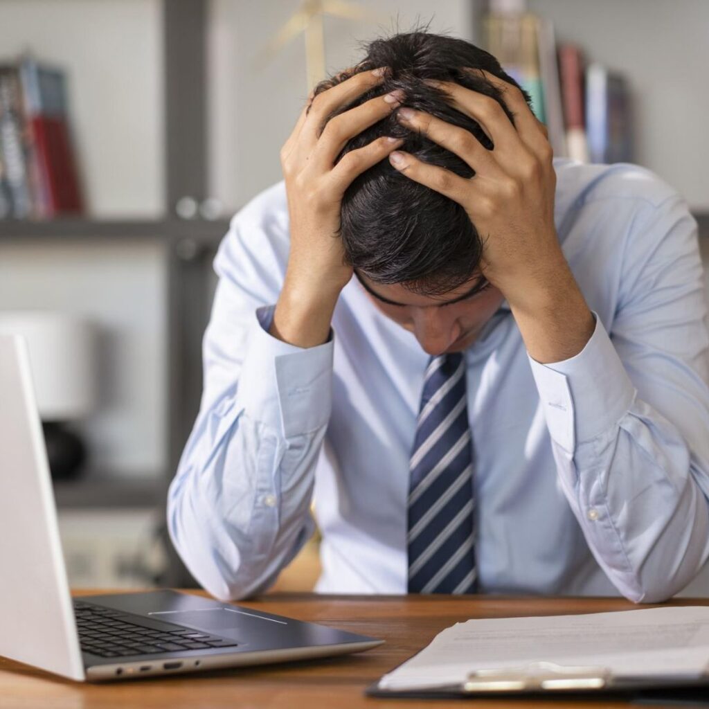 Working professional experiencing stress and mental fatigue from long work hours seeking stress management in Ayurveda